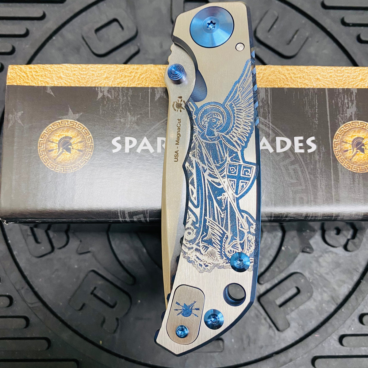 Spartan Blades Harsey Folder - BLUE Saint Michael, 4" Magnacut Blade, Blue ANO Hardware Knife